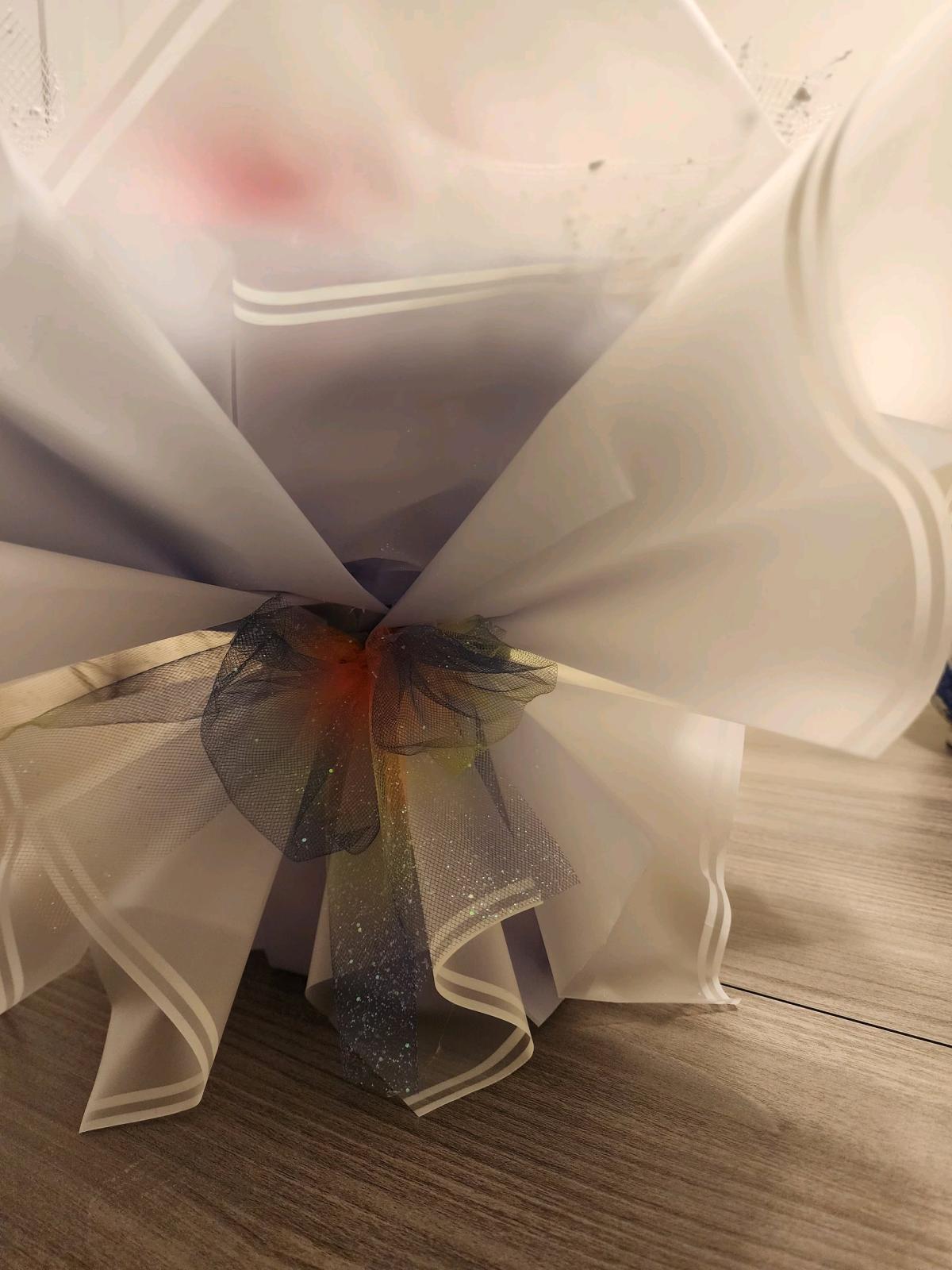 Pink and lavender satin ribbons roses bouquet