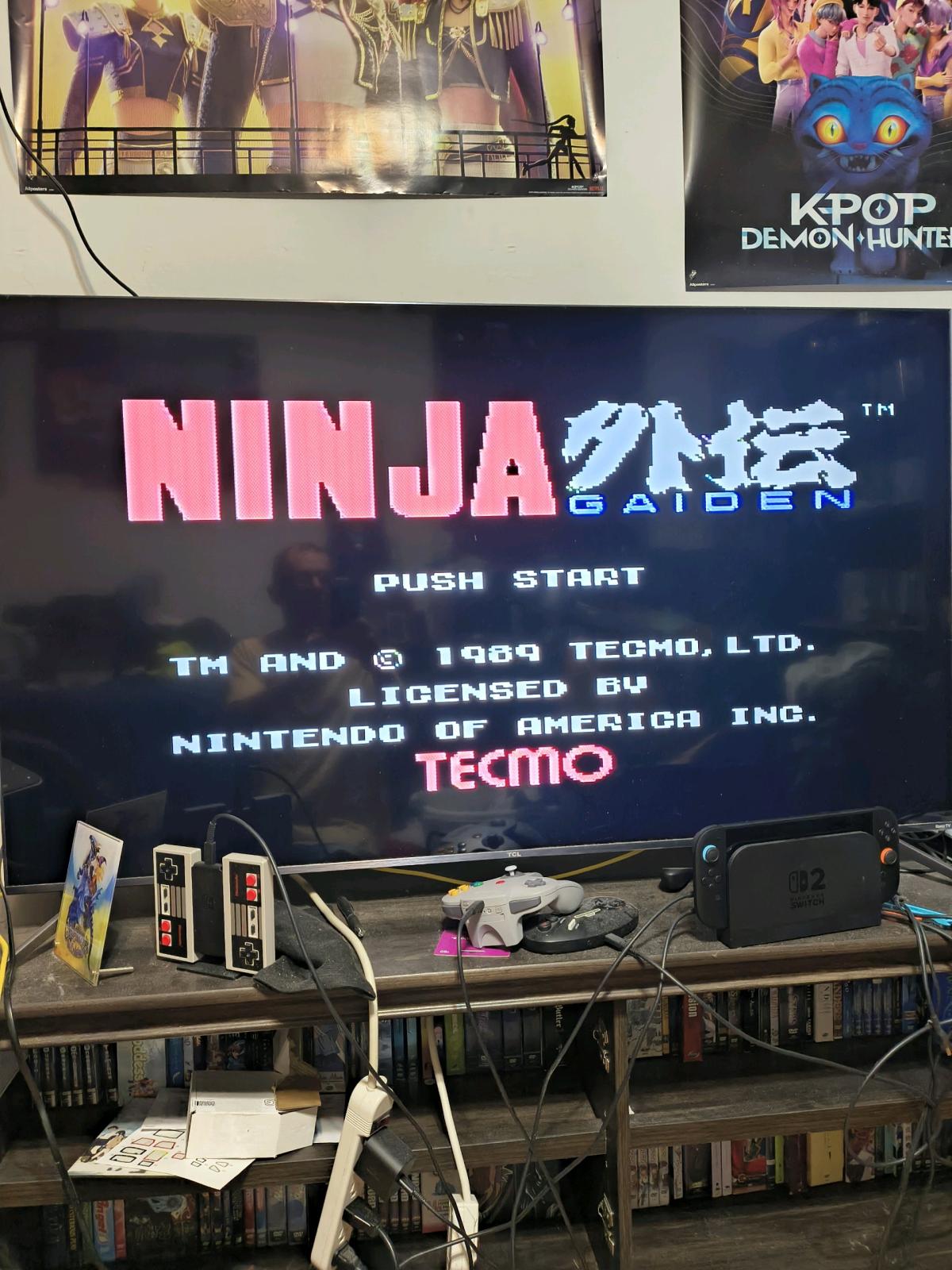 2 Nintendo NES consoles with controllers zapper gun and 11 g