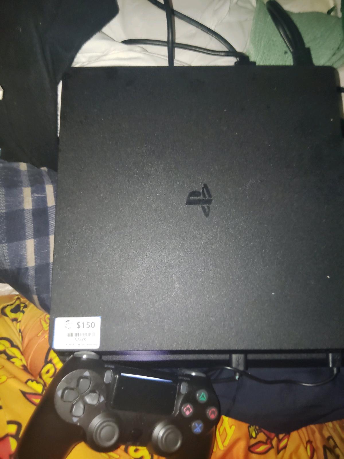 a used PS4 with everything in there
