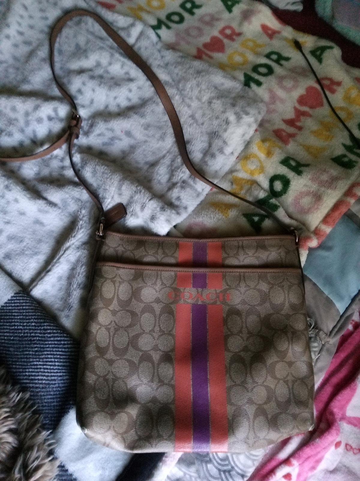 purses name brand and near jewelry armor