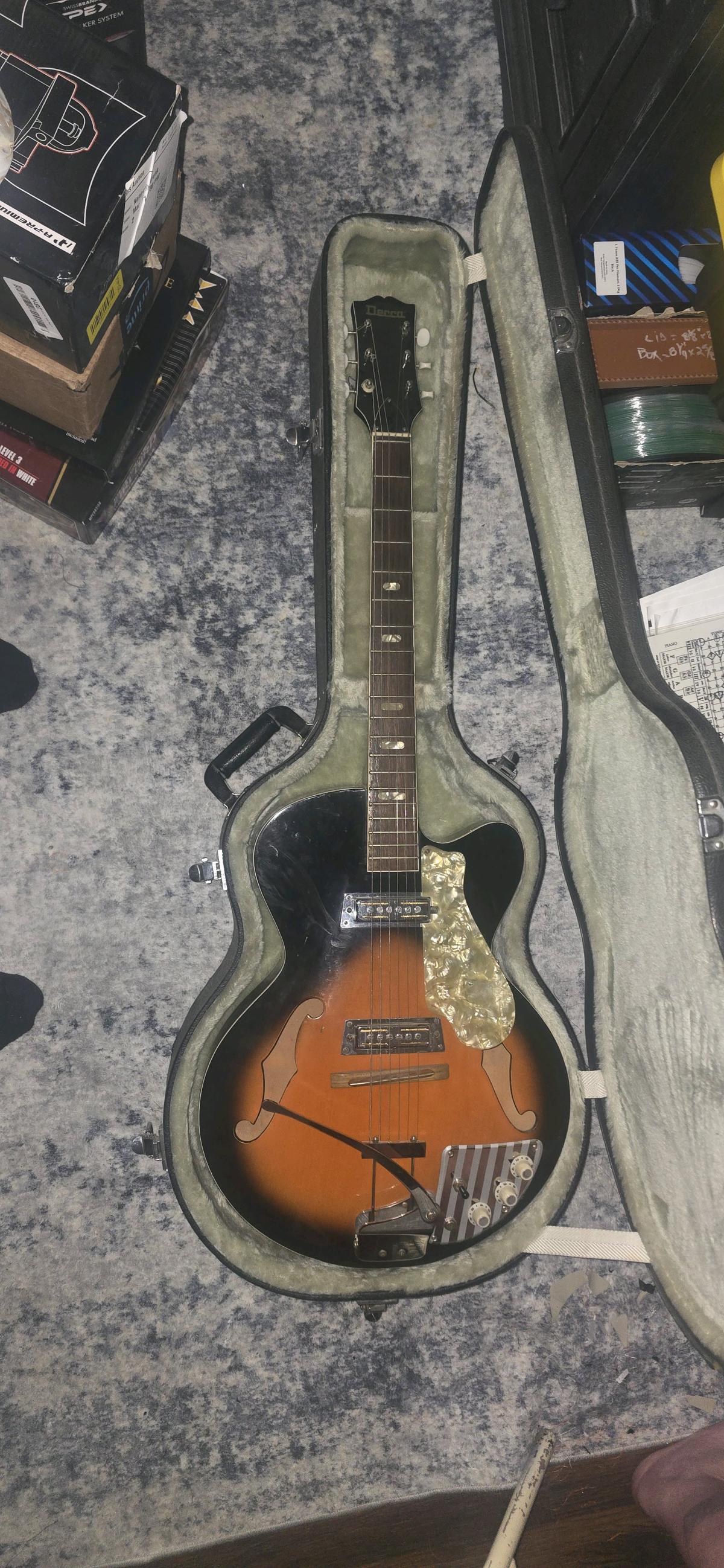 1960 Decca by Tiesco semicolon body guitar with case