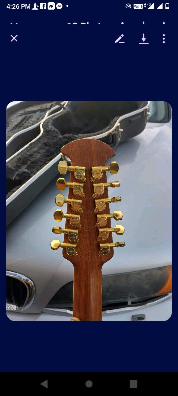 ovation 12string acoustic guitar with case