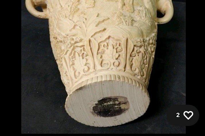 Chinese style collectible vase with 3D carvings of life