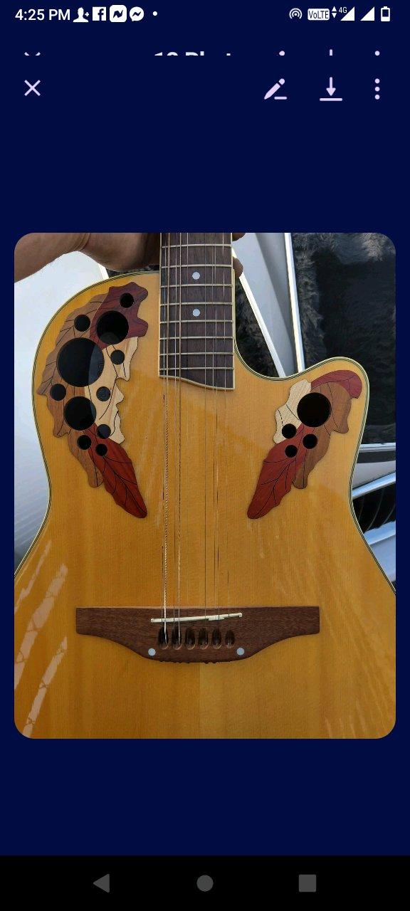 ovation 12string acoustic guitar with case