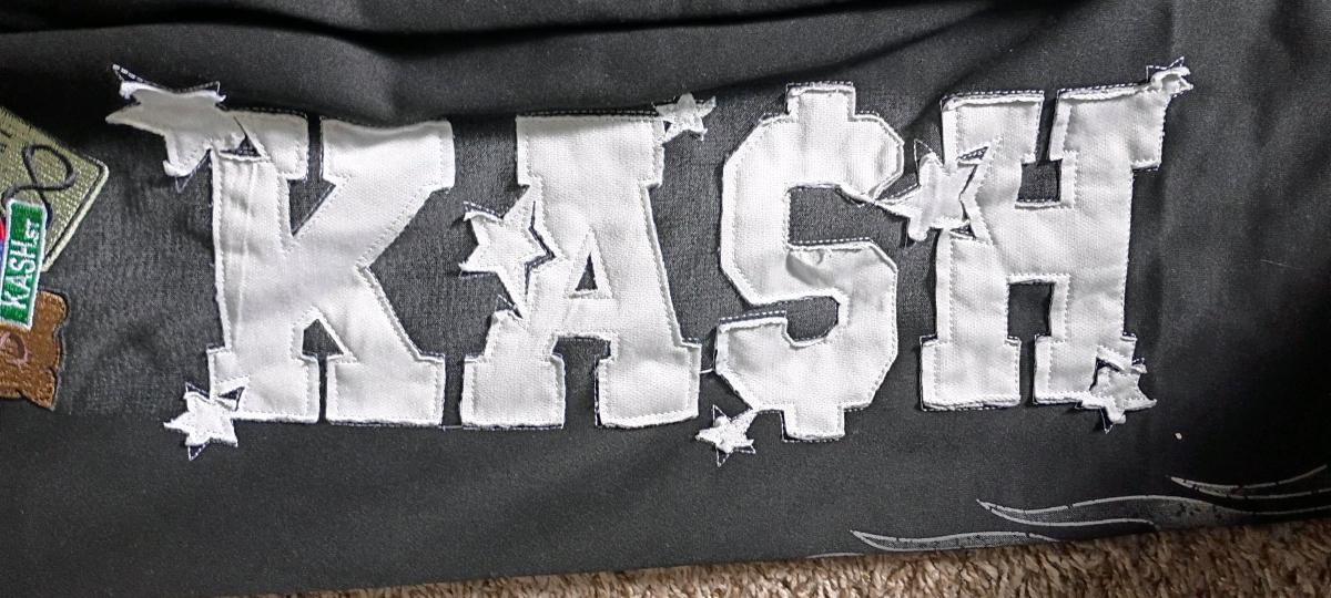 black and grey Kash print sweatpants