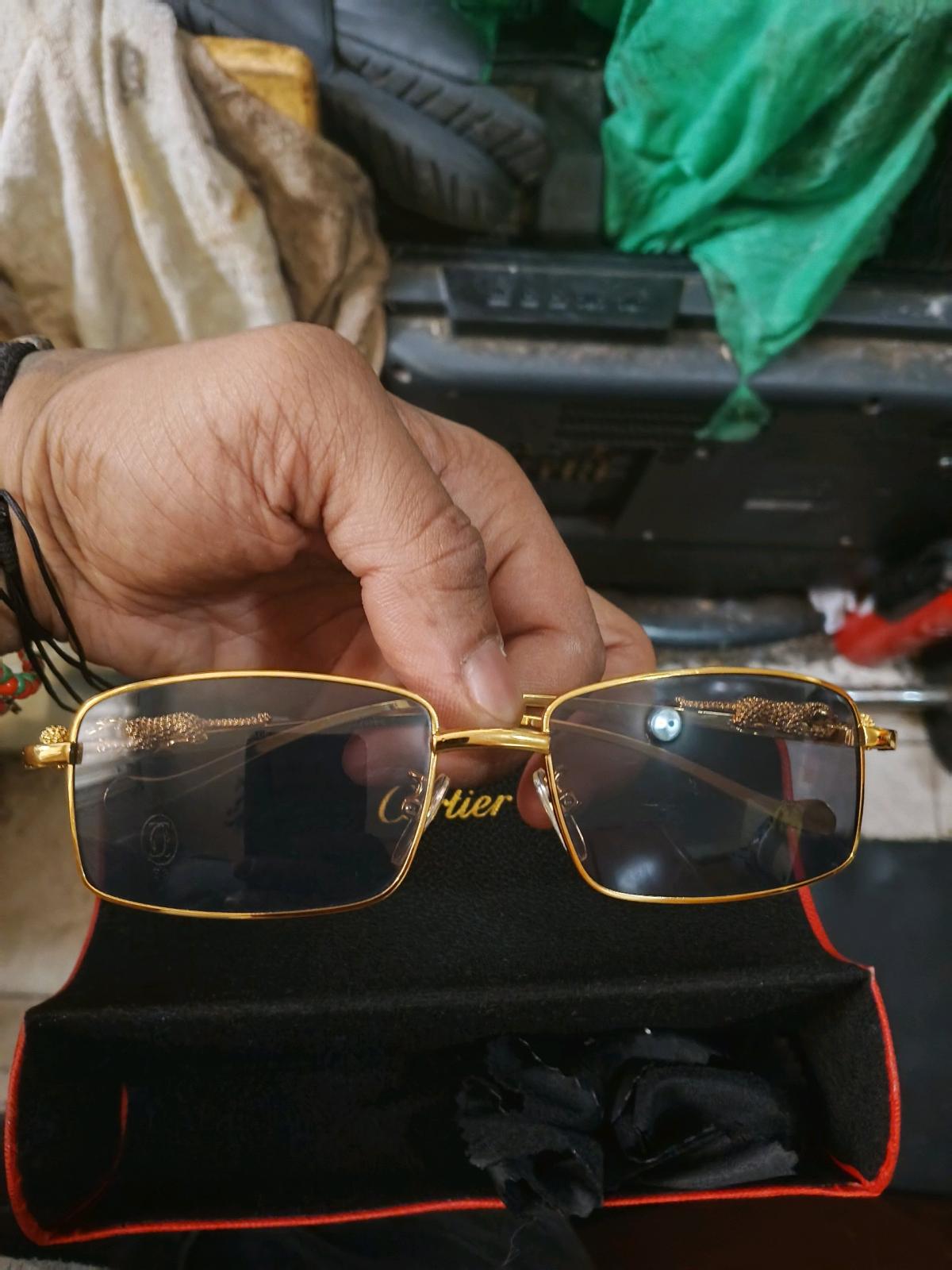 Cartier sunglasses  goldtone  leopard frame