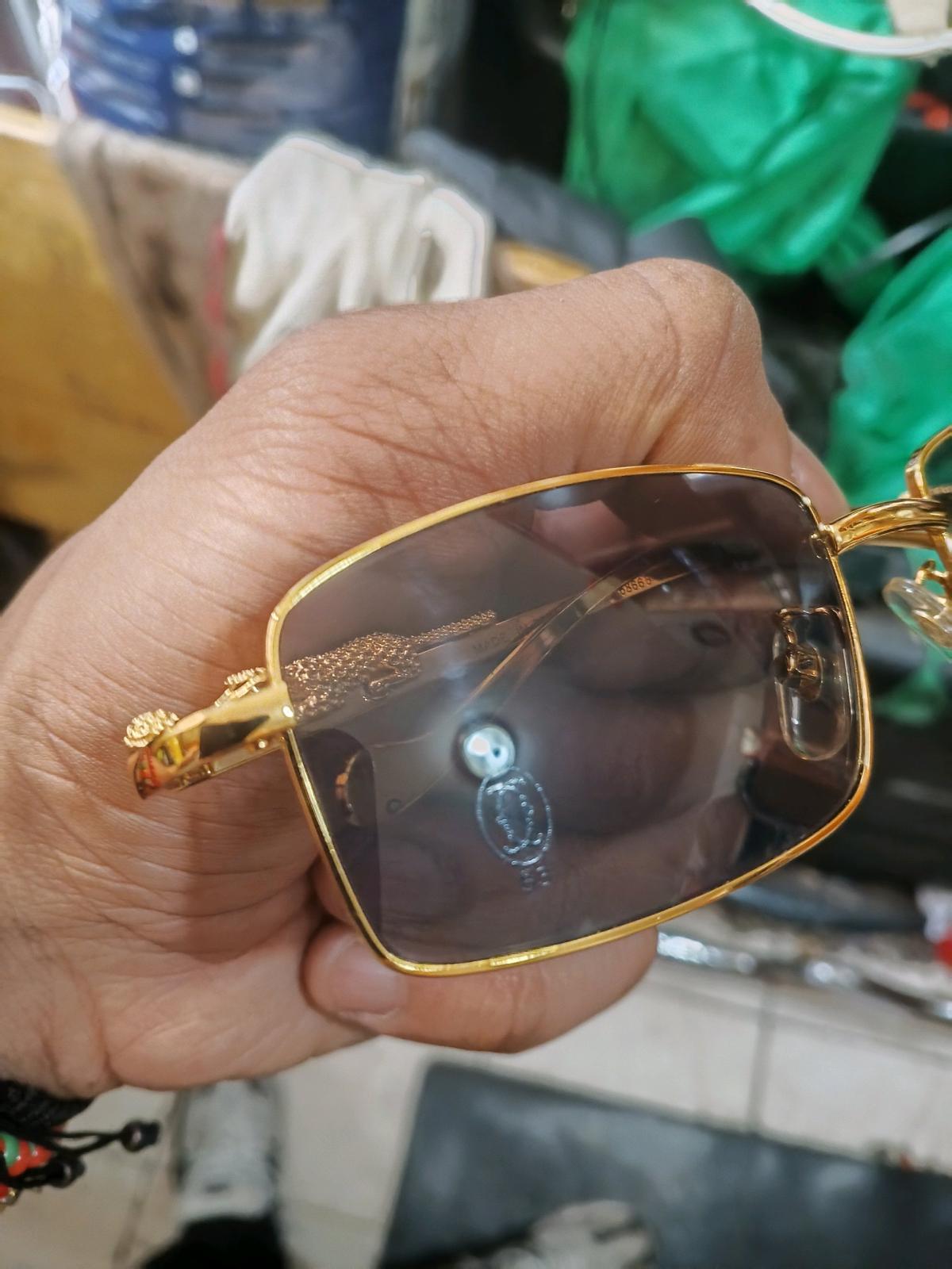 Cartier sunglasses  goldtone  leopard frame