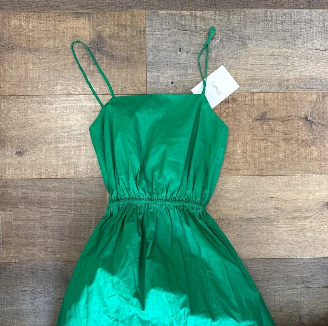 Emerald green dress with pockets
