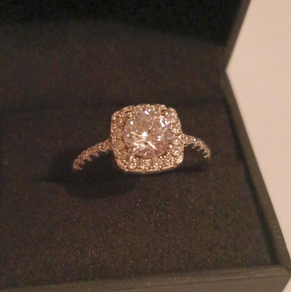4 prong silver engagement ring with a 4ct natural diamond