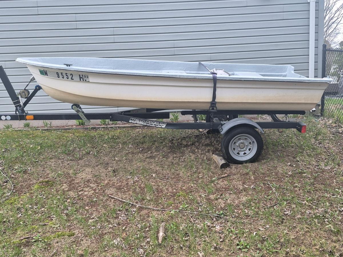 boat and trailer freshly painted bought but never used