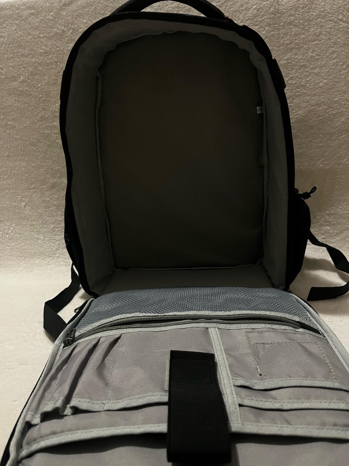 ESDDI black camera backpack with red accents and reflective