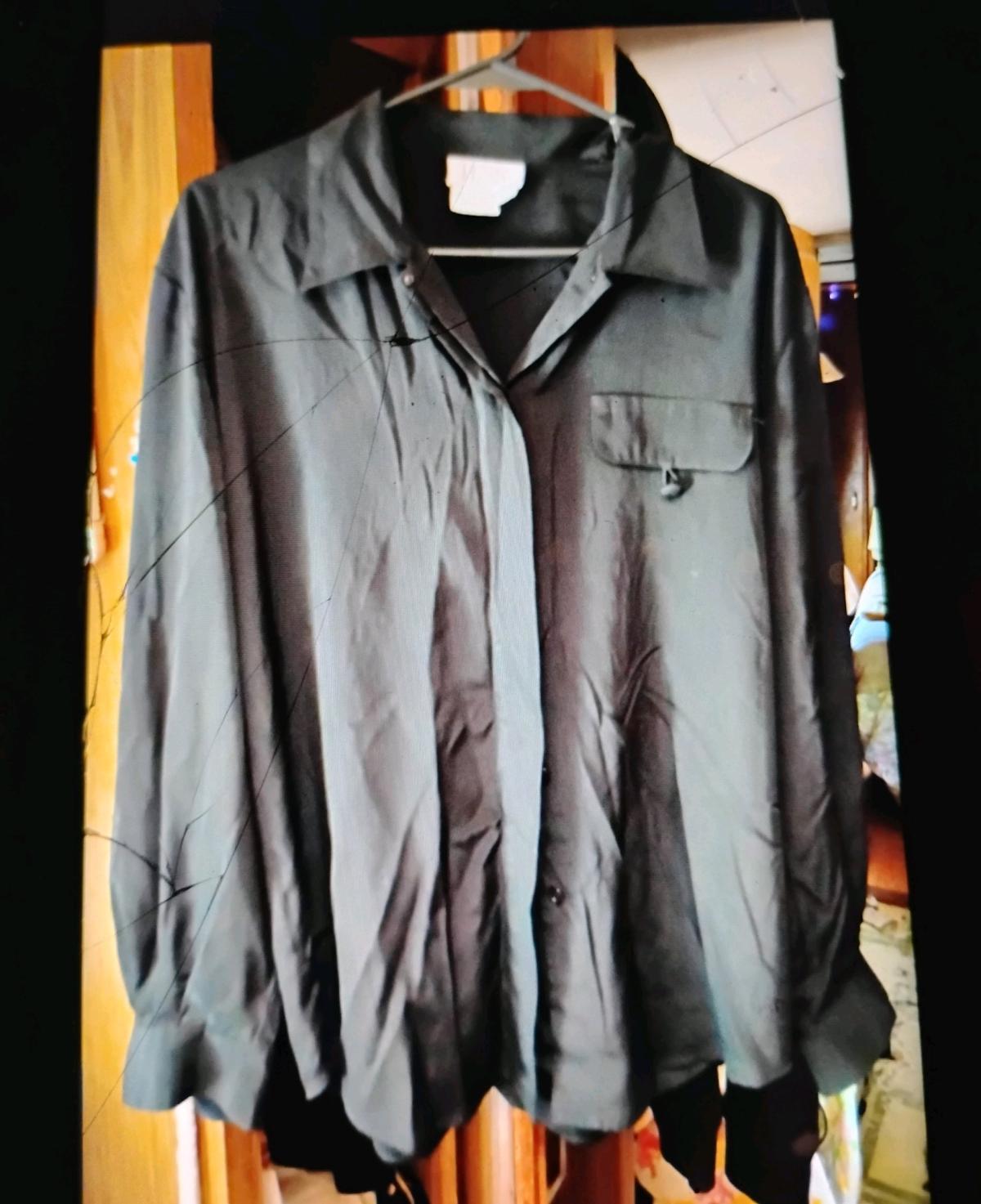 A Nice Long Sleeve Button Down Black Top