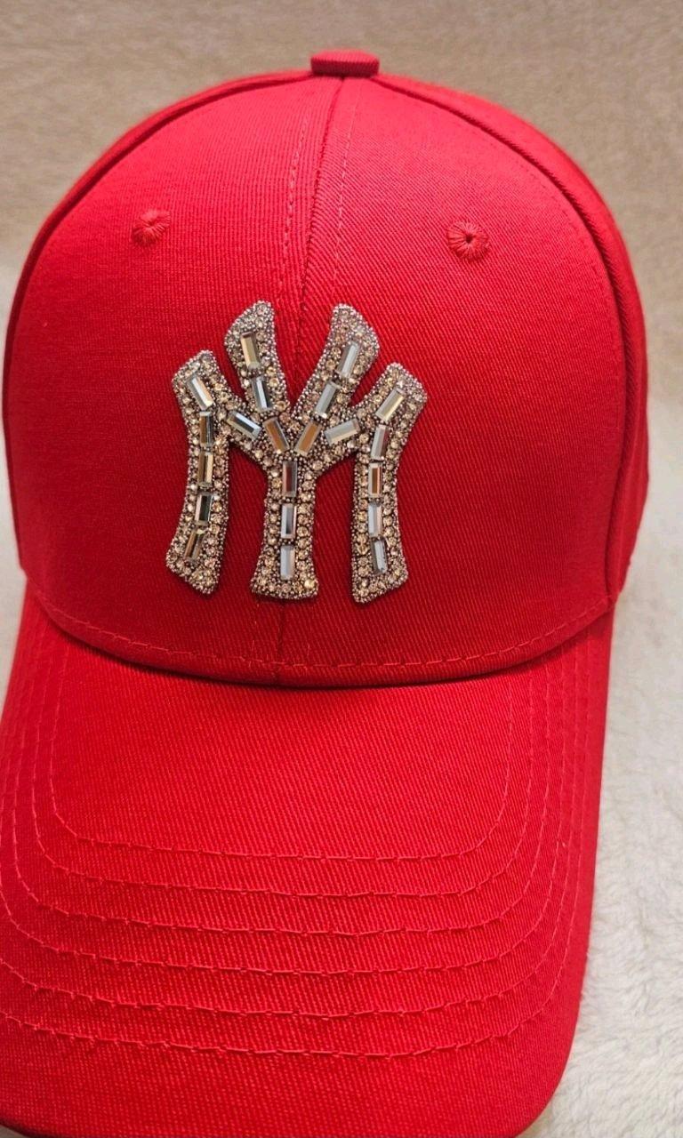 Stylish red fashion cap with shiny rhinestone design