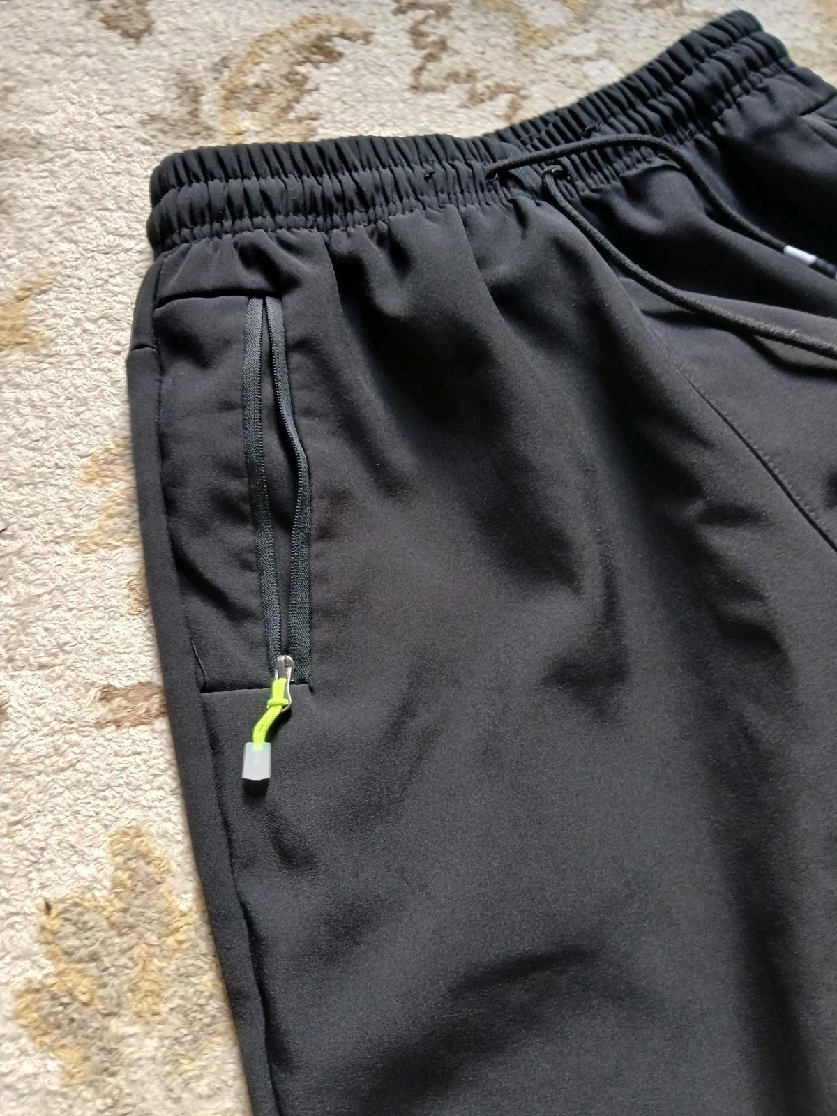 black sweatpants two zipper pocket