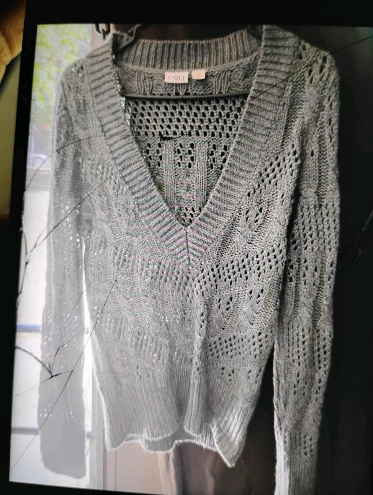 A Sexy Womans New Grey Long Sleeve VNeck Sweater