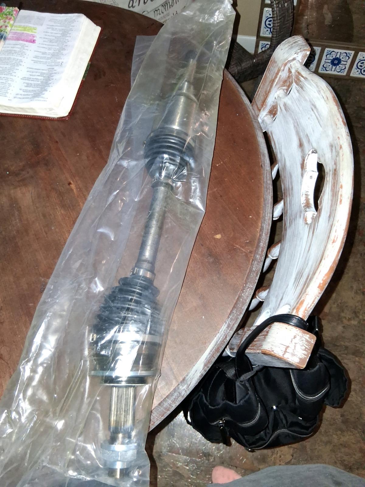left axle and water pump hose brand new doing box never been