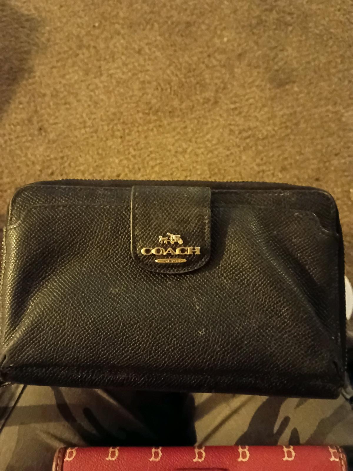 assorted womens name brand wallets