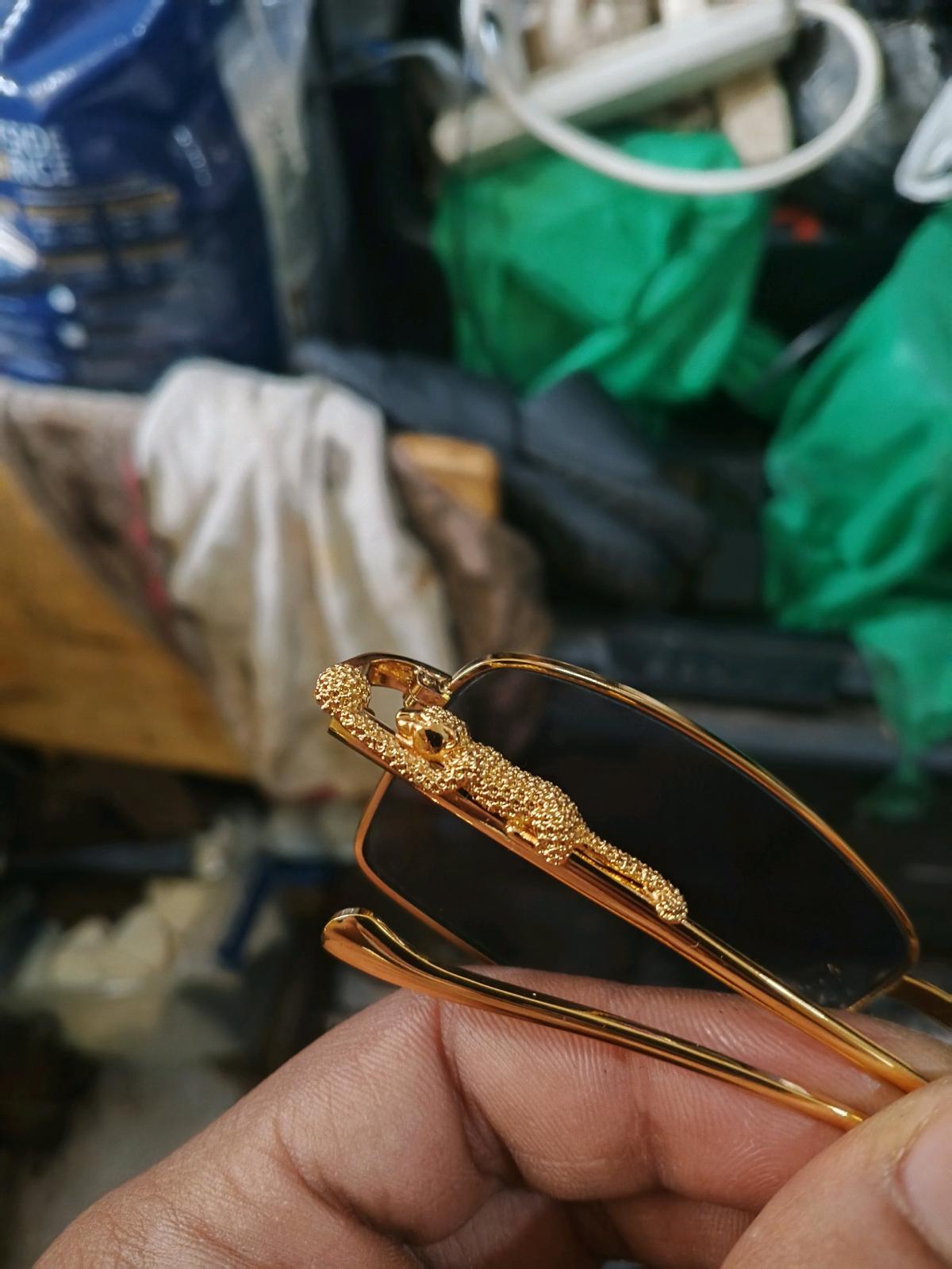 Cartier sunglasses  goldtone  leopard frame