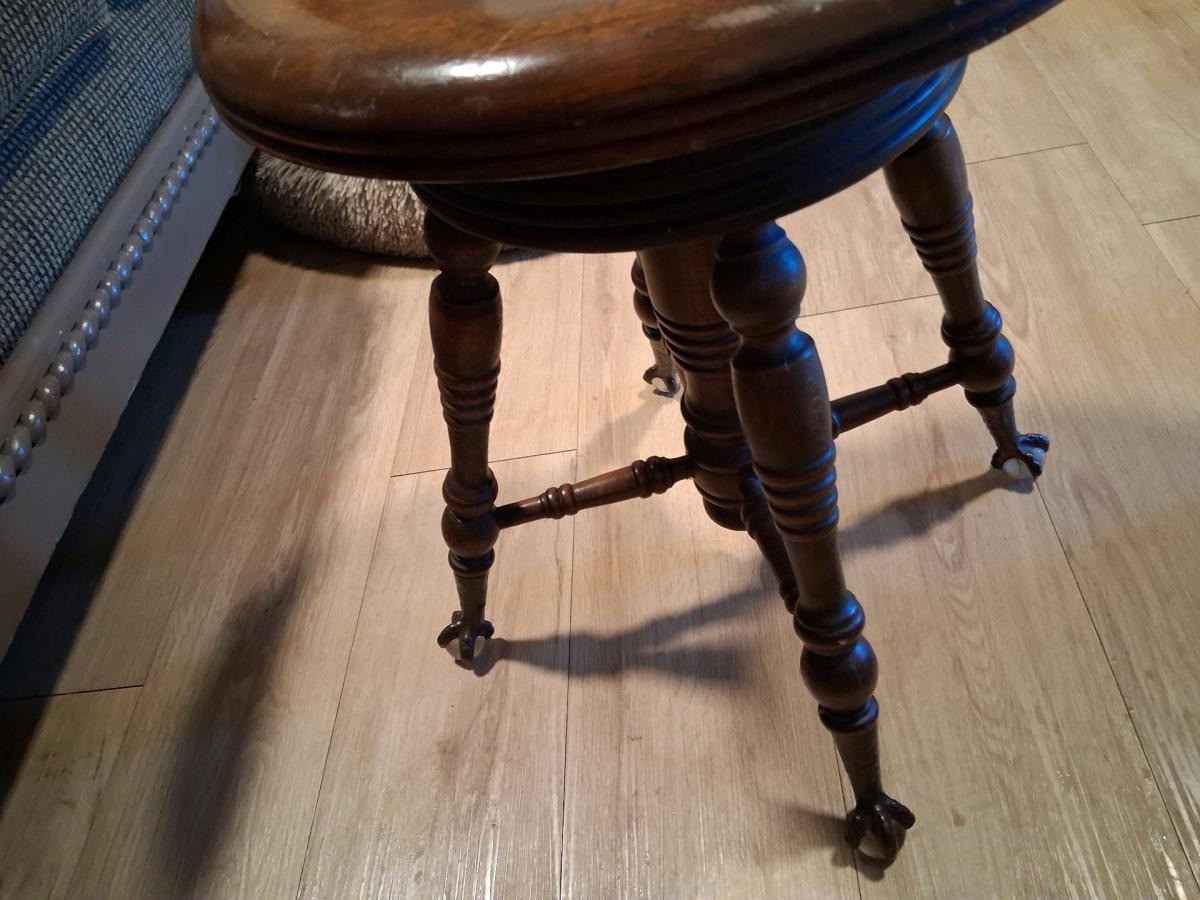 H HOLTZMAN ANTIQUE WOODEN CLAW FOOT PIANO STOOL