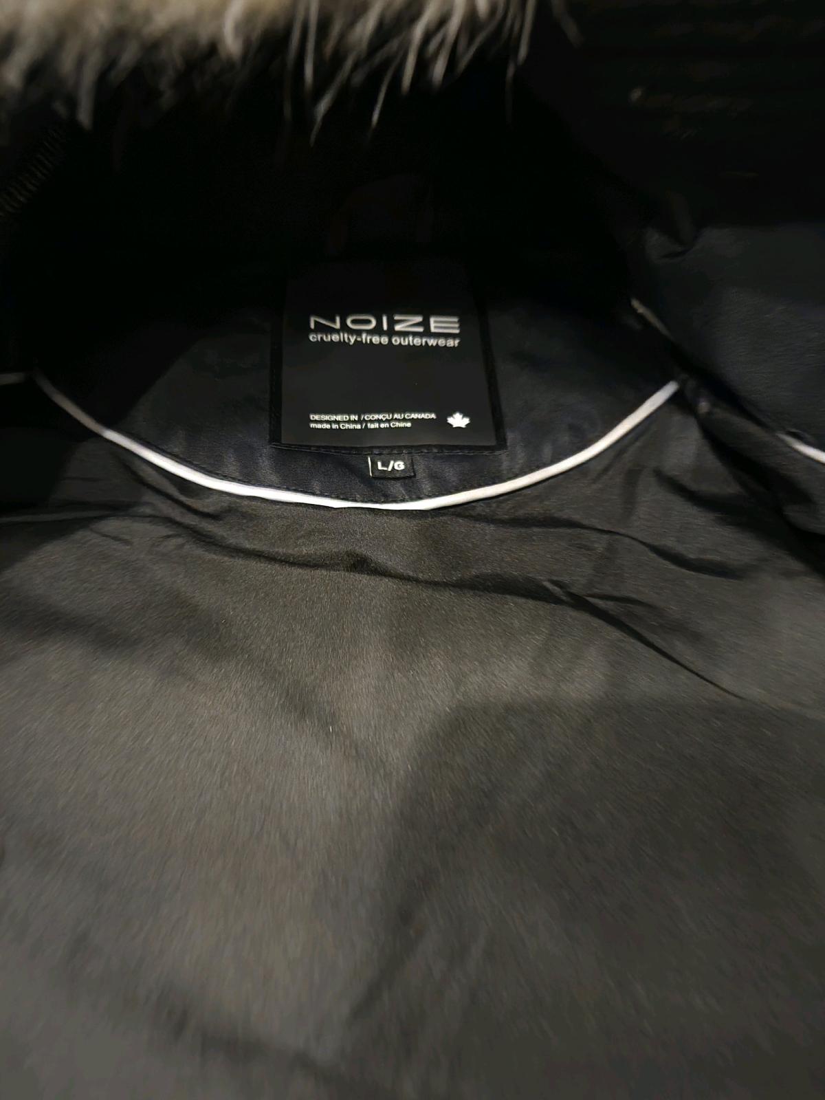 Noize Women long parka sz large Brand New Never worn