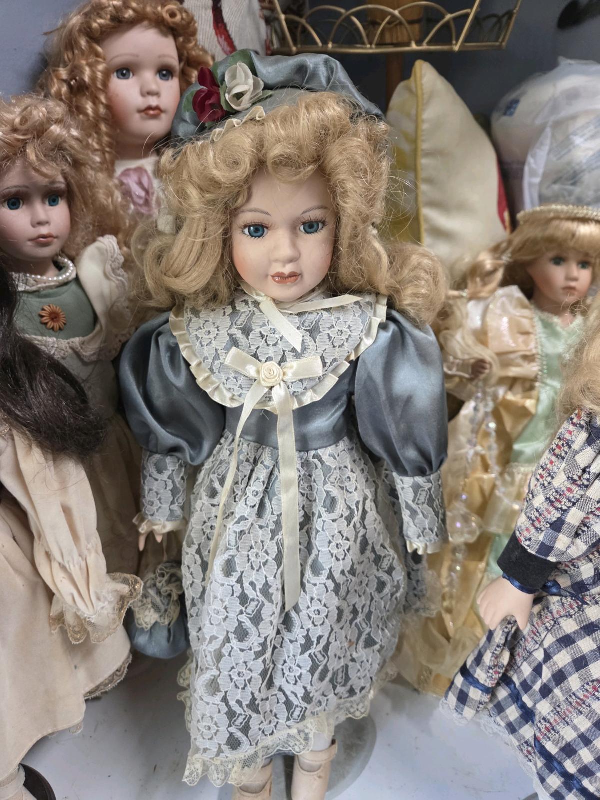 porcelain dolls all old original clothes an accessories