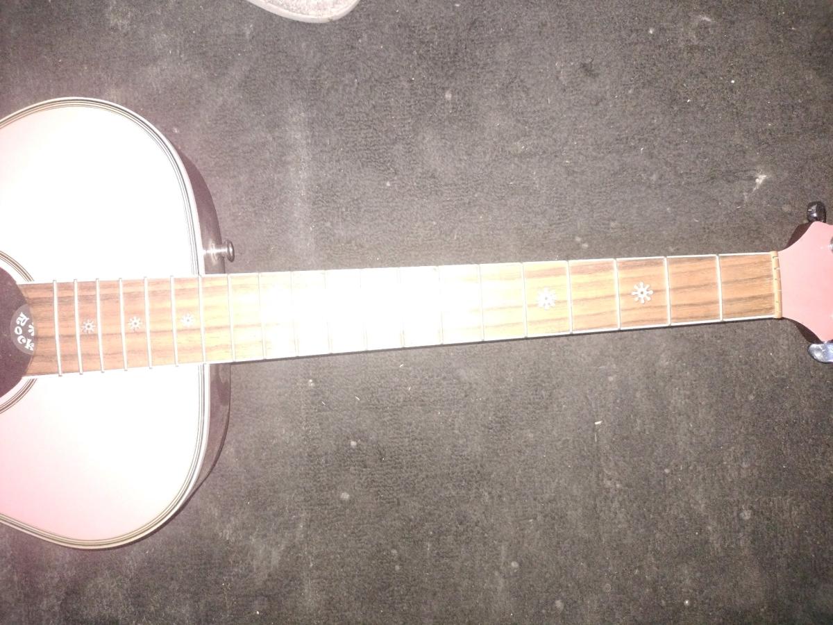 Pink daisy rock guitar