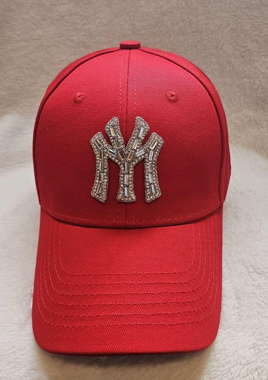 Stylish red fashion cap with shiny rhinestone design
