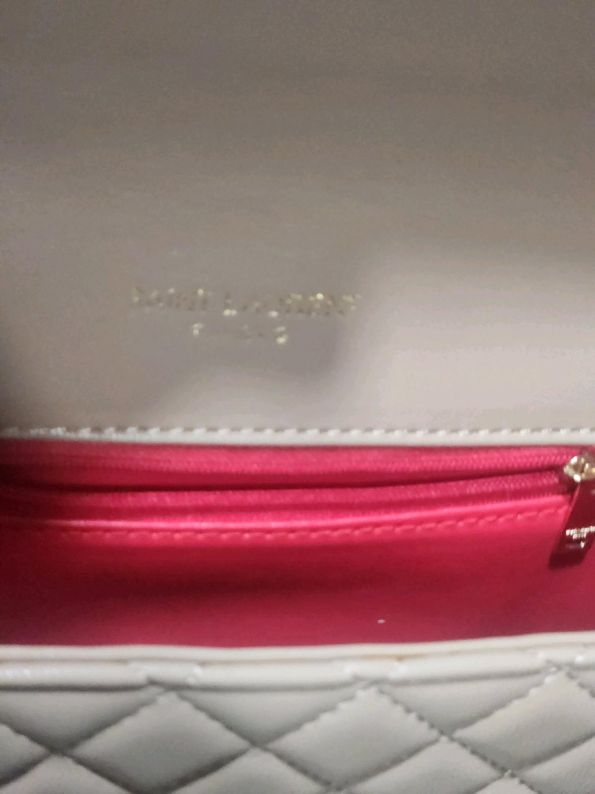beige woman purse