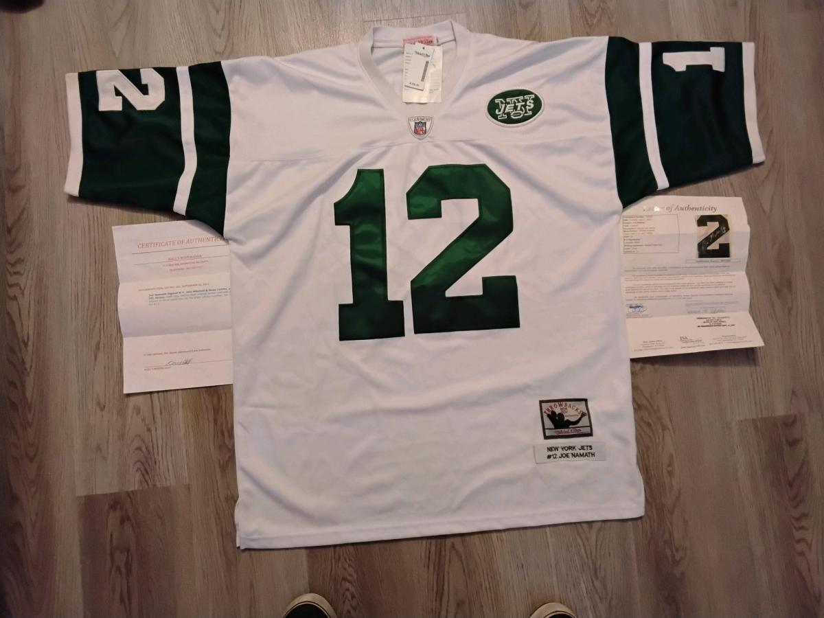 Football jersey with paper work and also sing by player