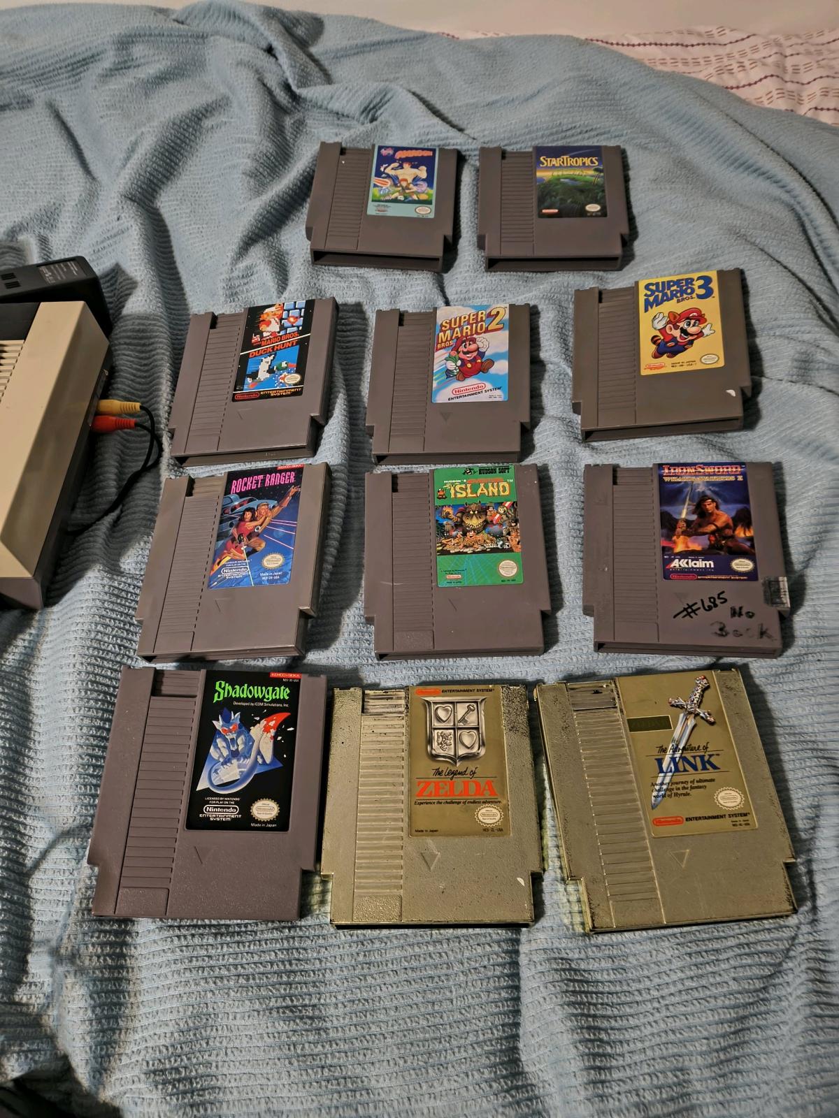 2 Nintendo NES consoles with 11 games and free Sega Genesis