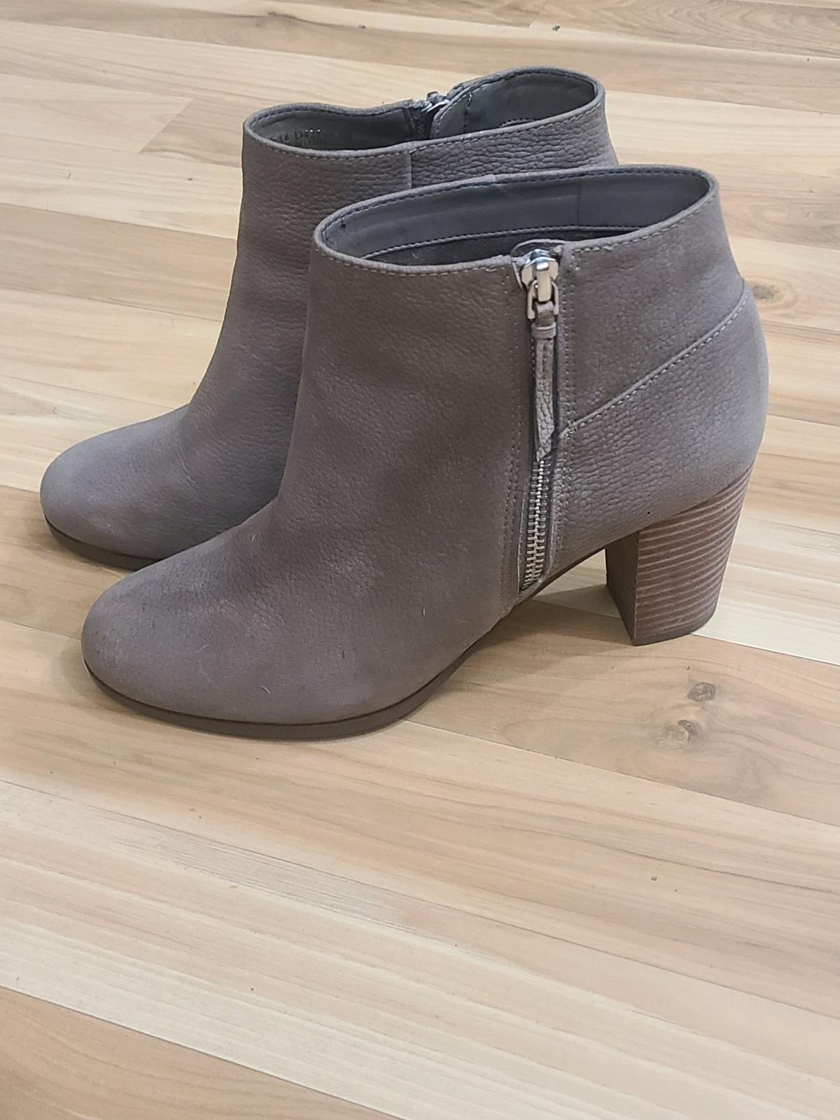 Cole haan  high heel booties with the zipper on the side