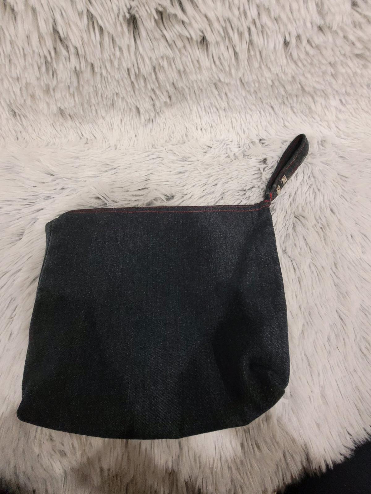DIY upcycled denim makeup or travel bag
