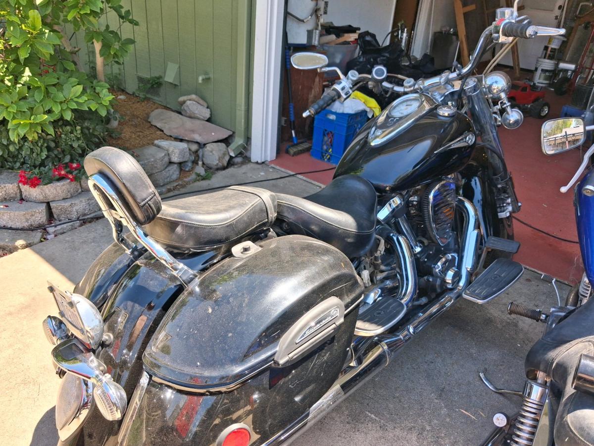 motorcycles and various travel bags