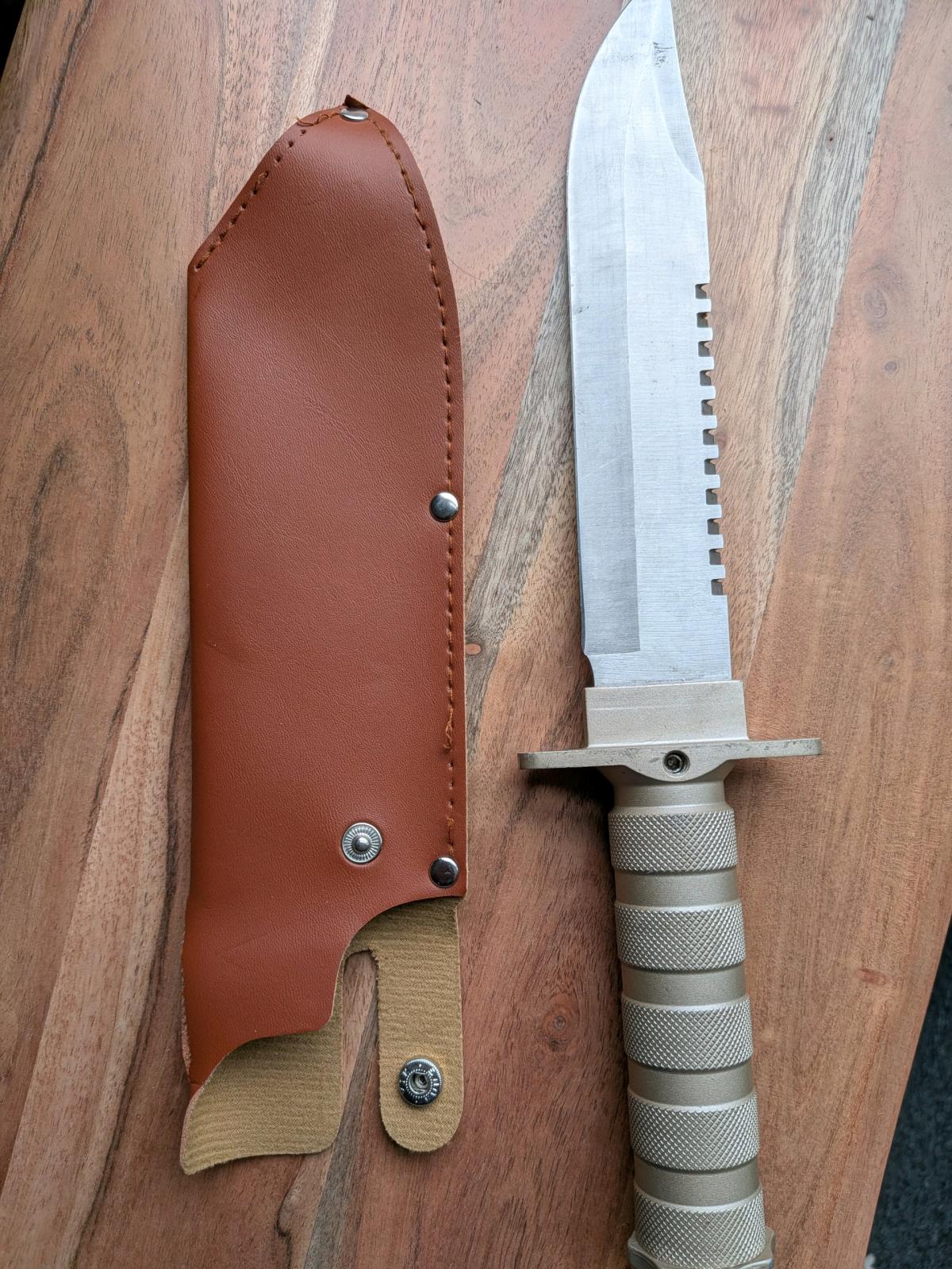 survival knife really cool knife just cleaning up some stuff