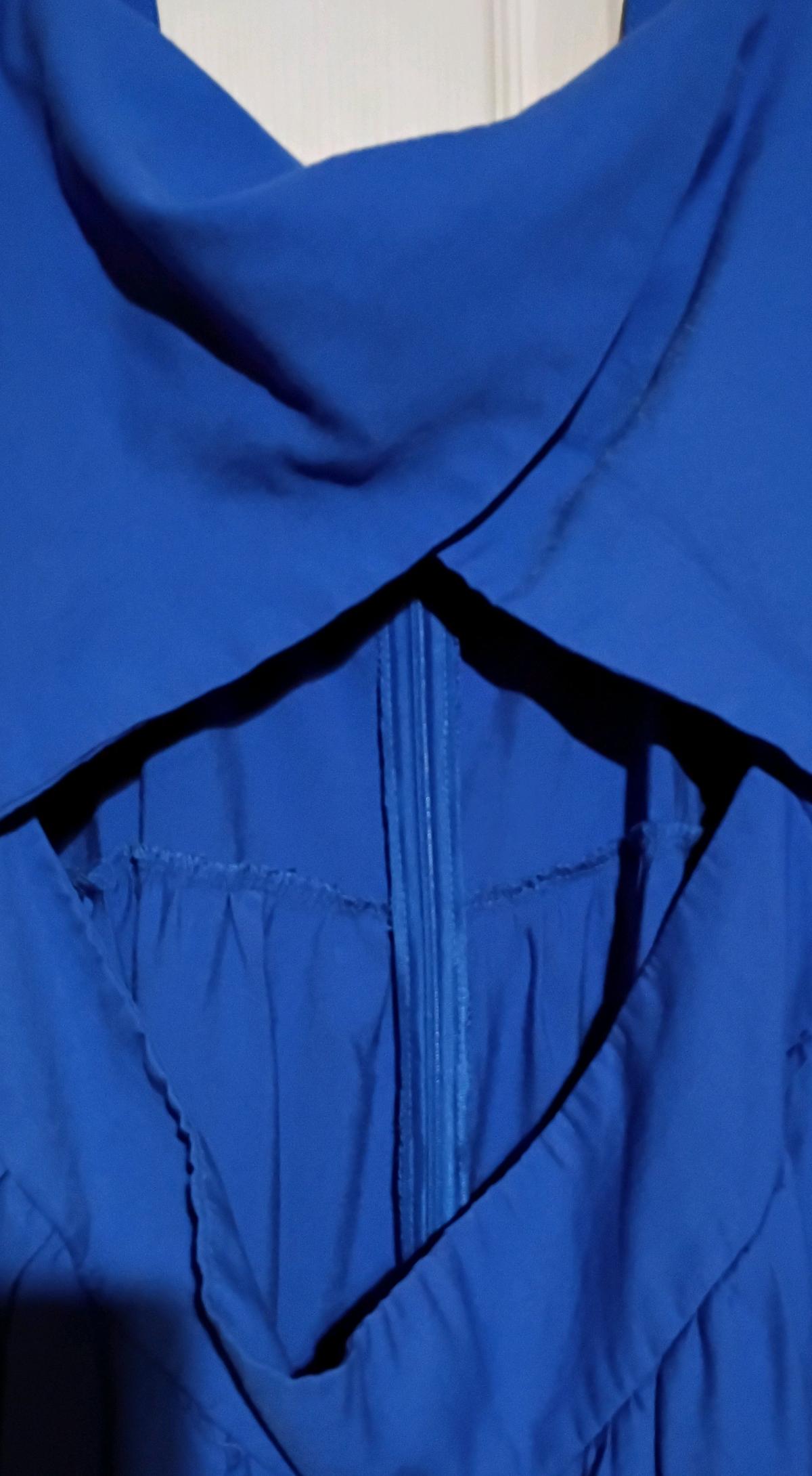 Beautiful blue jumpsuit with belly cut out by Shein