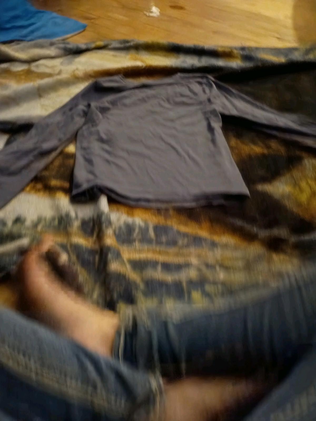 gray long sleeve shirt with colorful snow flacks