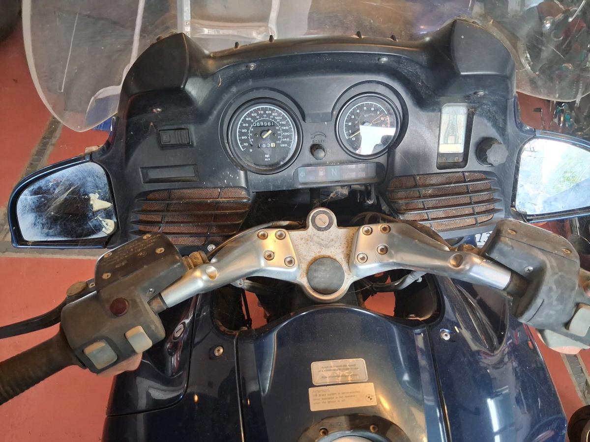 motorcycles and various travel bags