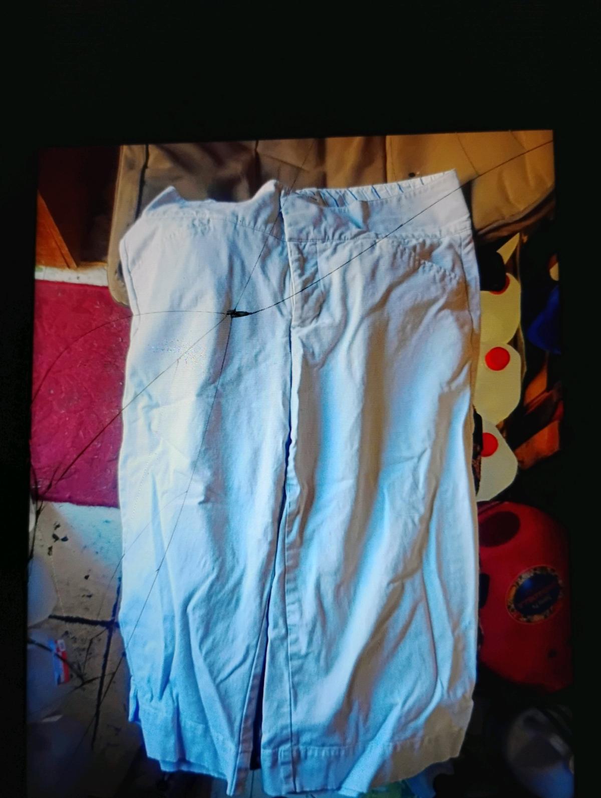 A Cream Color Pair of Womens Capri Pants