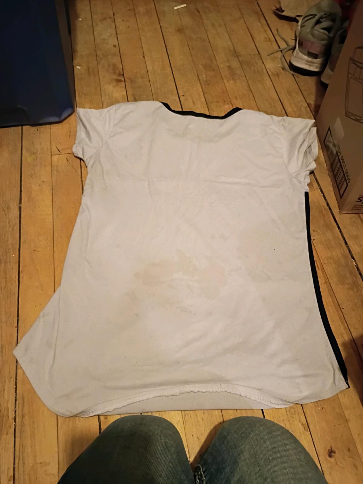 womans size L hustle shirt made of cotton