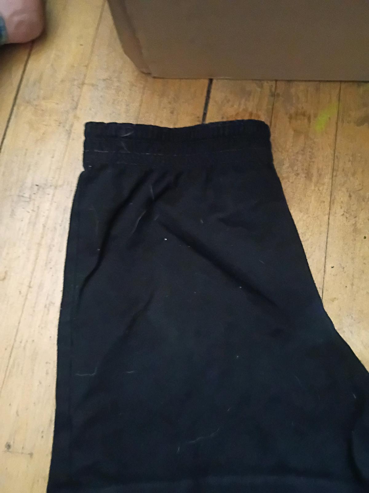 black shorts with pink waist band