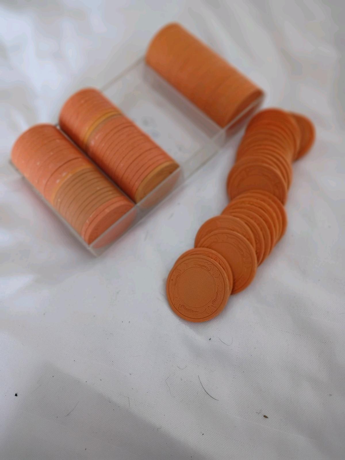 vintage orange clay pokerchips