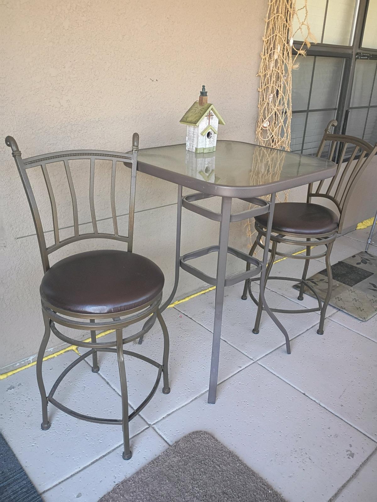 A light Glass and metal table set