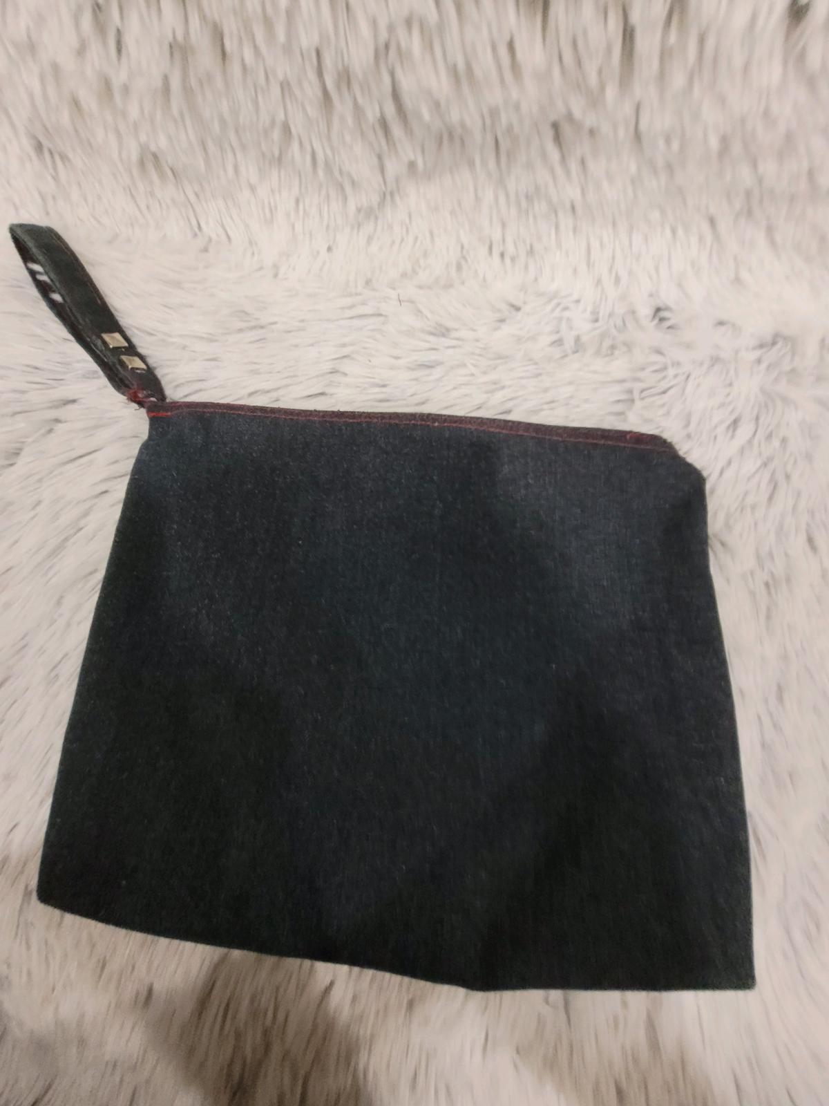 DIY upcycled denim makeup or travel bag