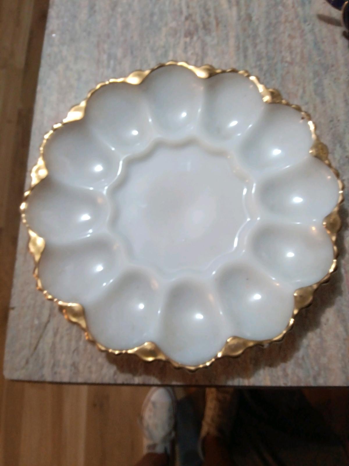 white deviled egg platter with 22karat gold rim