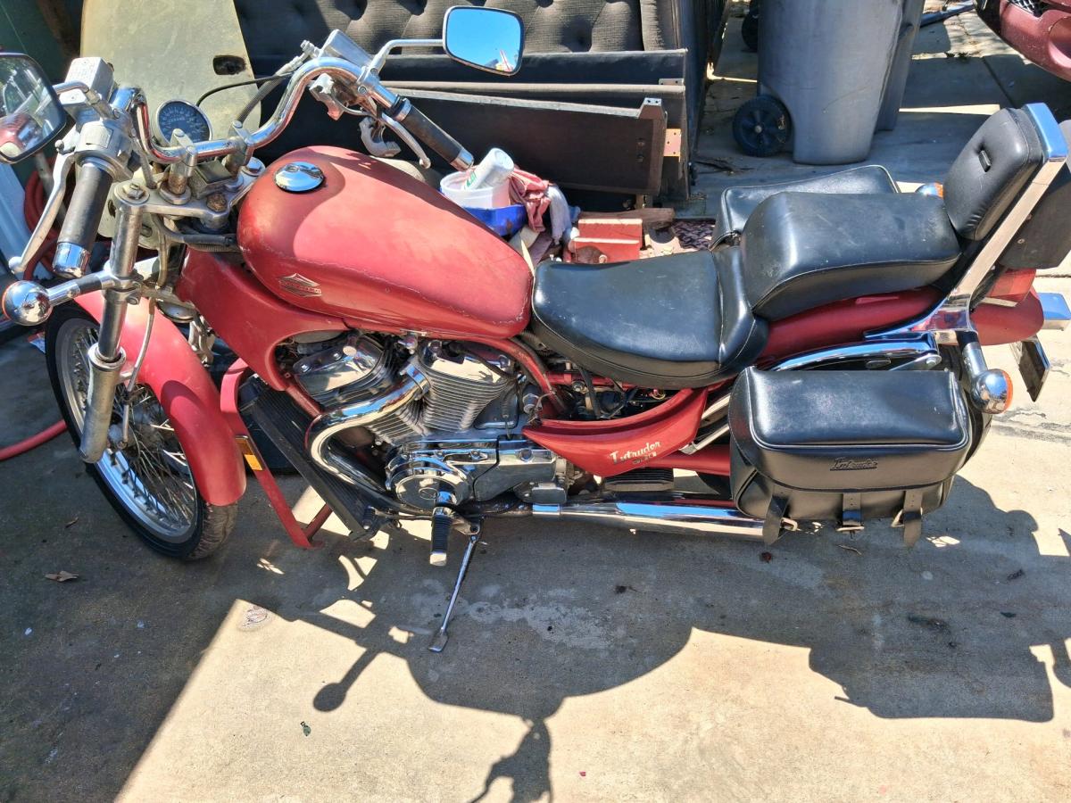 motorcycles and various travel bags