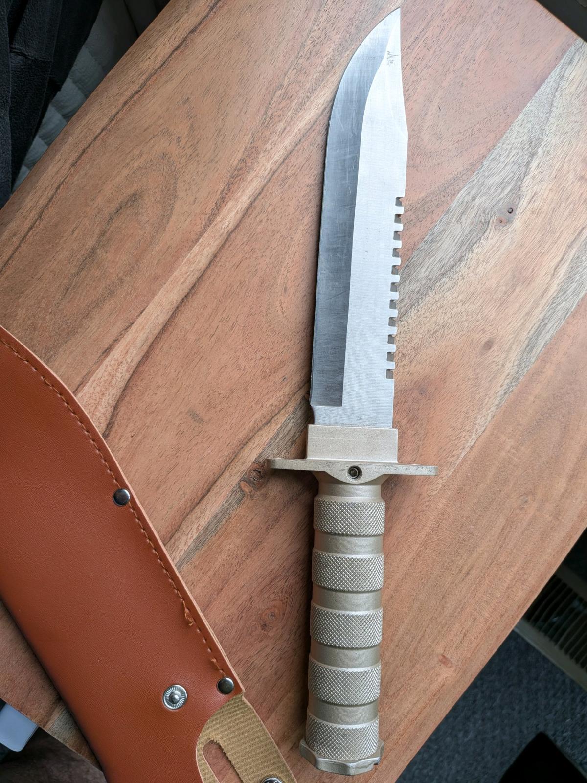 survival knife really cool knife just cleaning up some stuff