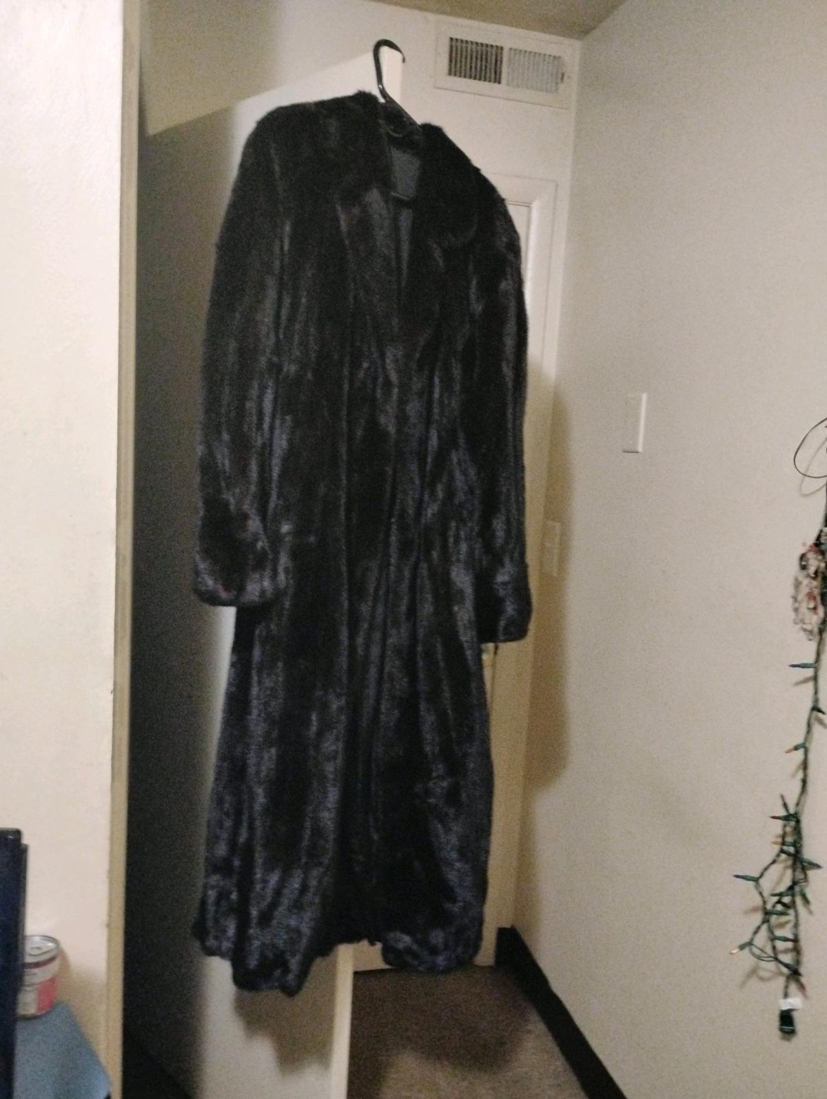 long black fur coat