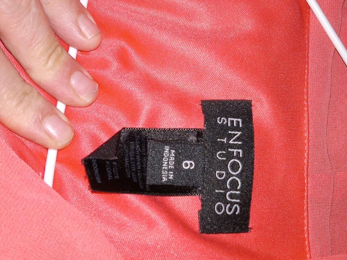 This is a size 6 Enfocus Studio coral dress made in Indonesi