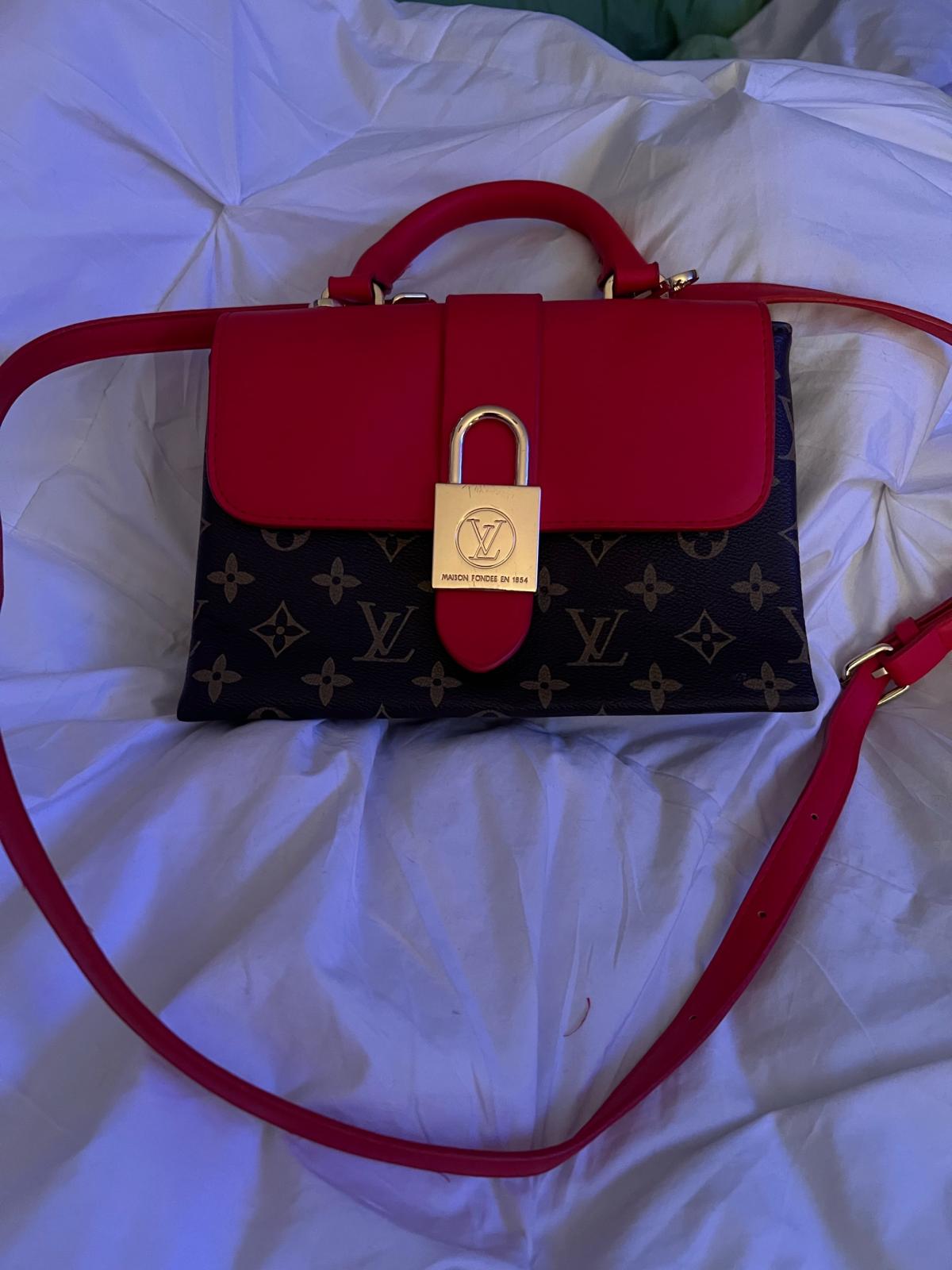 small red and brown with beautiful gold lock