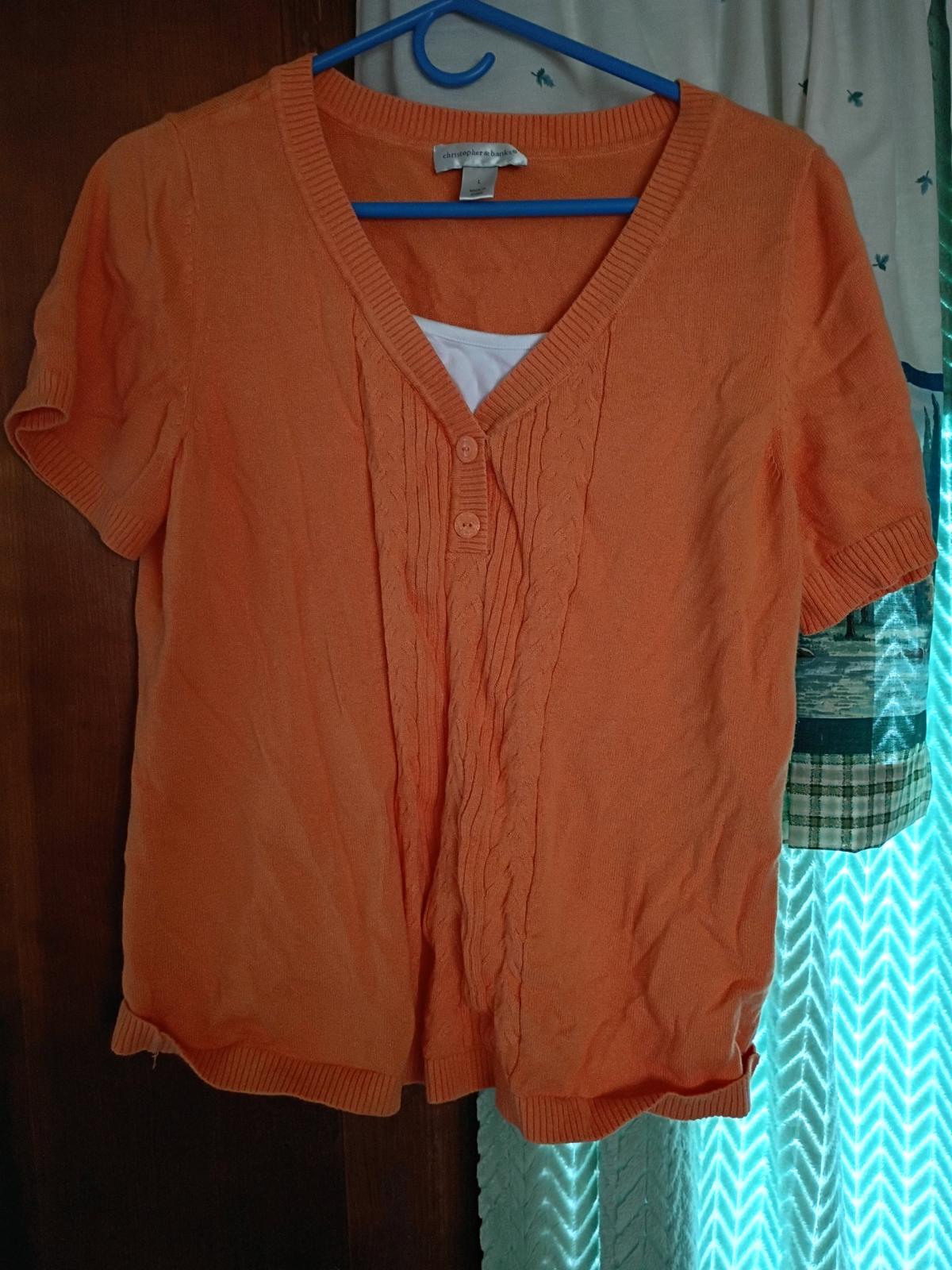 a orange blouse designer Christopher Banks